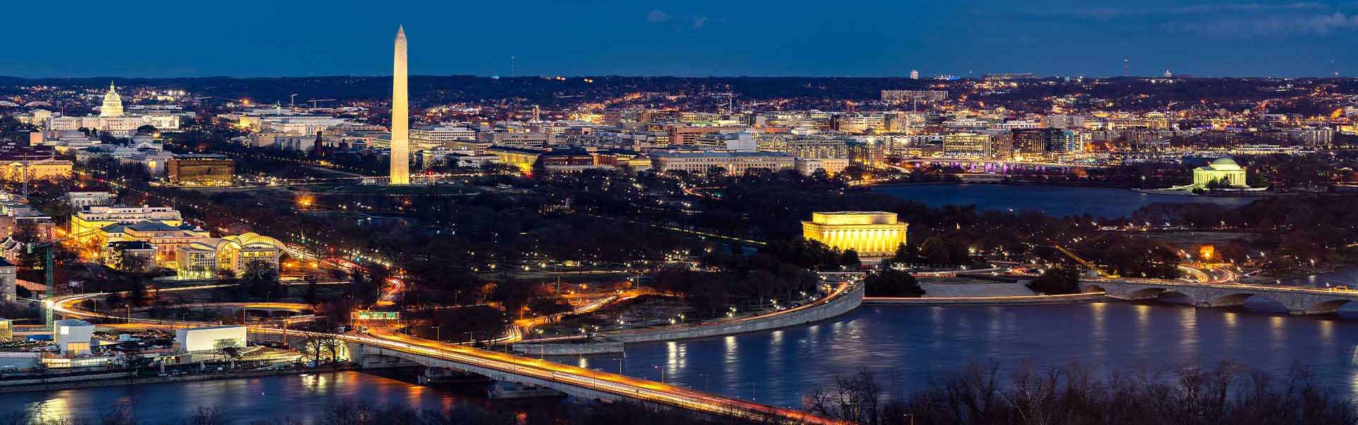 Neon color image of a band playing and people singing along